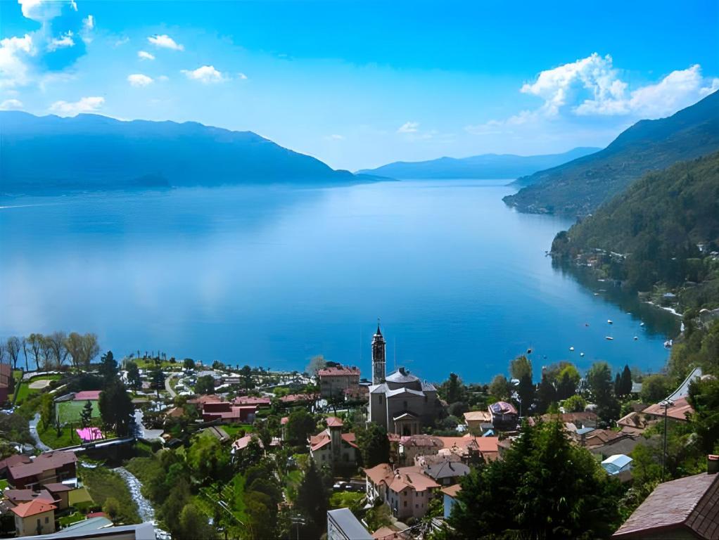 a view of a town and a lake at Il Pergolato in Cannero Riviera