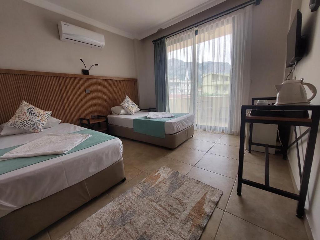 تصویر اتاق‌های Avlu Hotel - تصویر ۲