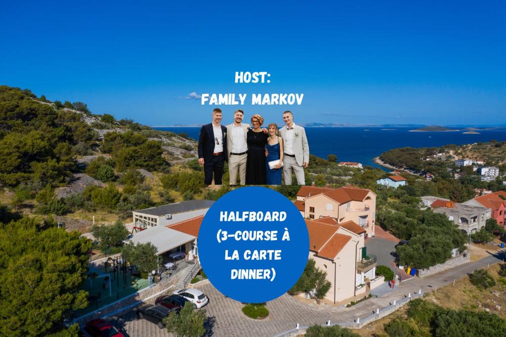 a group of people standing on top of a mountain at Hotel Murter in Murter