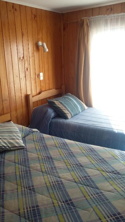 Postel nebo postele na pokoji v ubytování Hostal Costa Azul