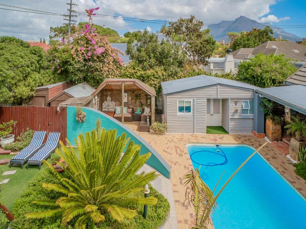 an image of a house with a swimming pool at Inn-Style in Cape Town