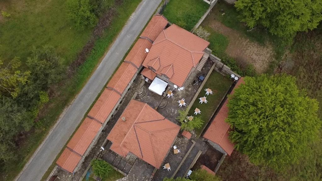 an overhead view of a house with red roof at Kompleks Gurman in Pʼklište