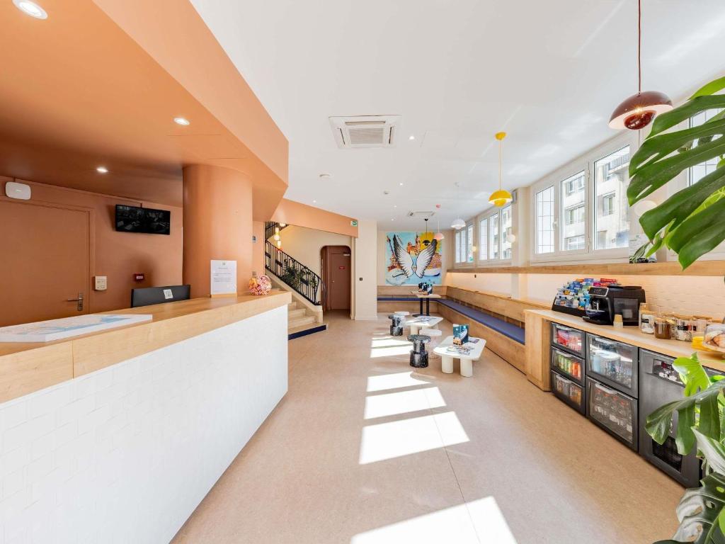 a lobby of a hospital with a waiting room at ibis Styles Marseille Centre Prado Place Castellane in Marseille