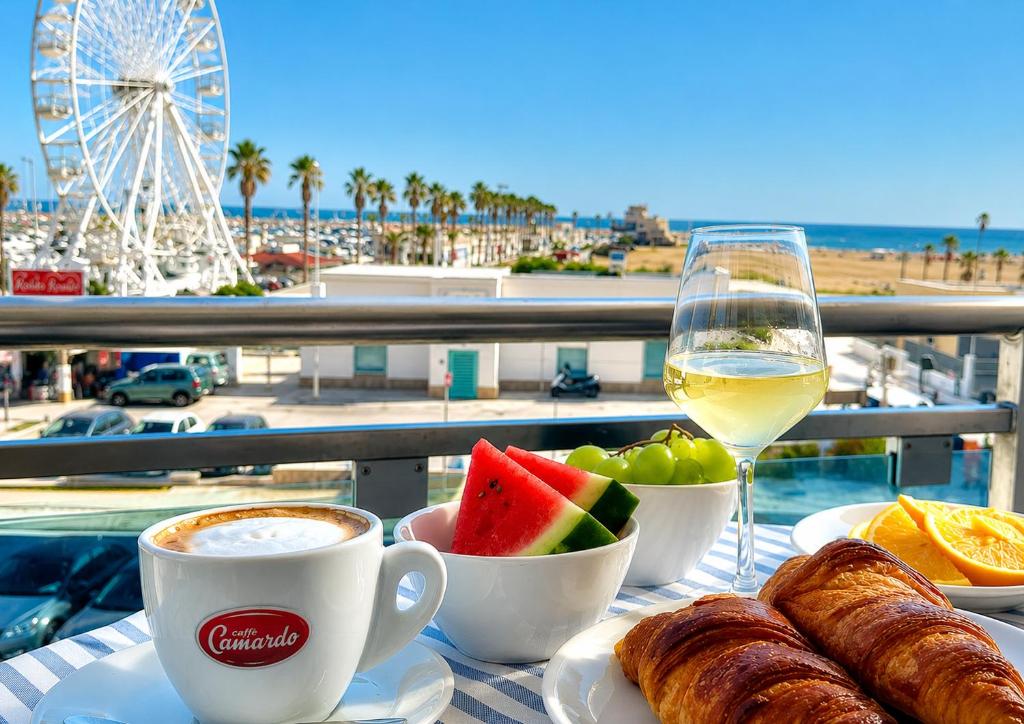 a table with a plate of food and a glass of wine at B&B Marina Sleep And Ship in Rodi Garganico