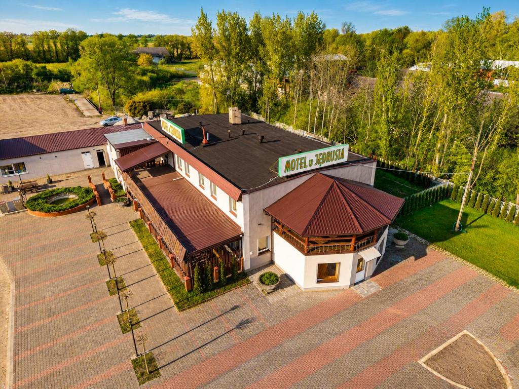 an overhead view of a house with a roof at Motel Ketmia in Plecka Dąbrowa