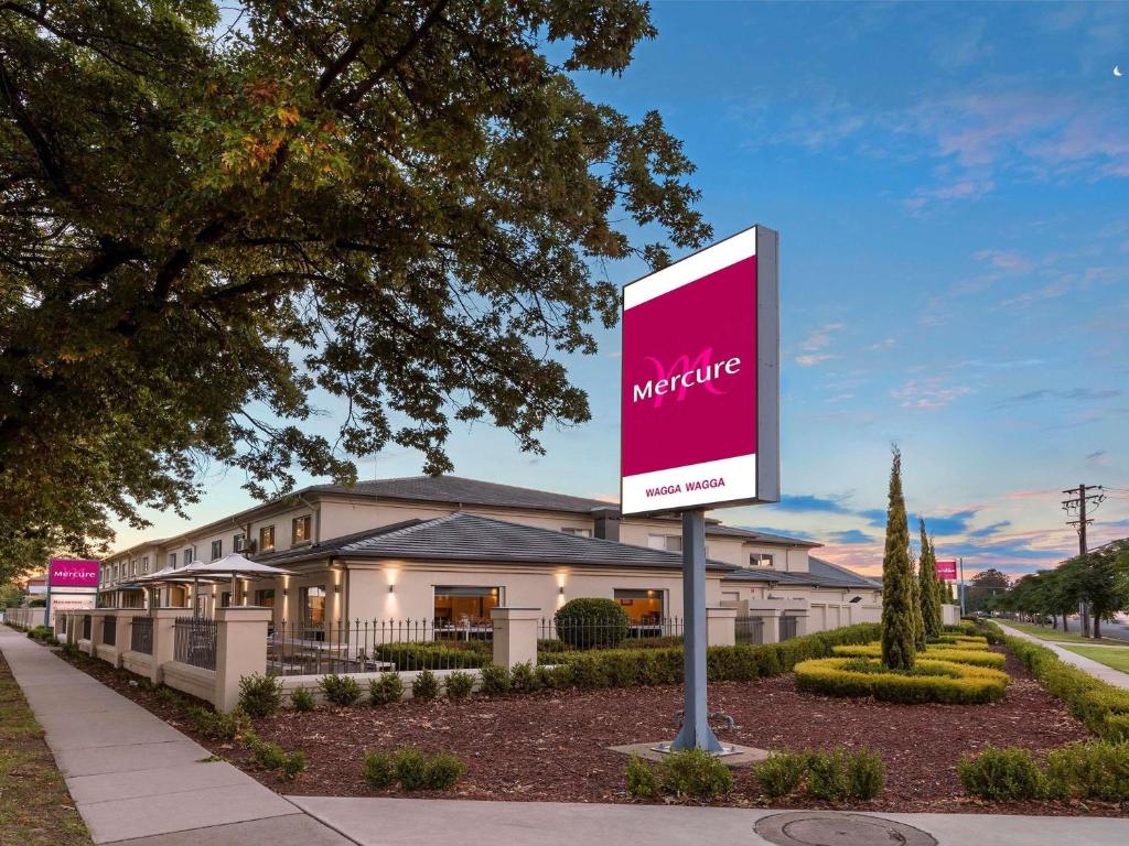a sign in front of a building at Mercure Wagga Wagga in Wagga Wagga