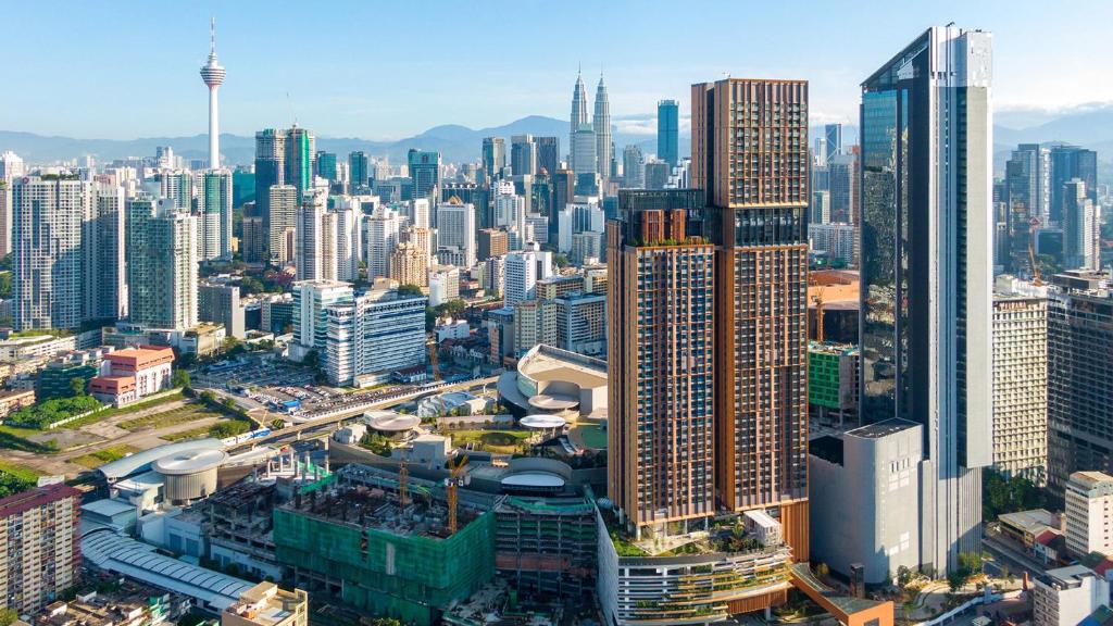 an aerial view of a city with tall buildings at Luxury Suites By Lucentia Residence BBCC Kuala Lumpur in Kuala Lumpur