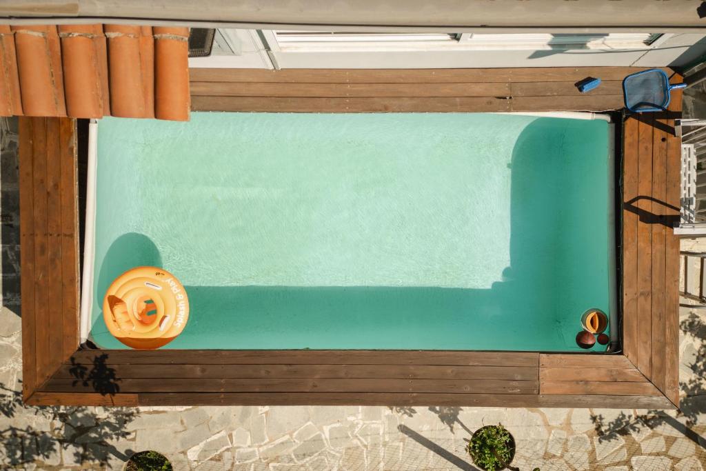a painting of a window in a house at pRETTy Home with Private Pool, Sea View in Nea Kallikrateia