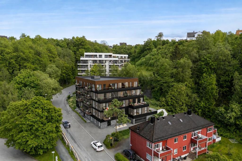 an aerial view of a apartment building and a street at Modern apartment with balcony and view in Trondheim