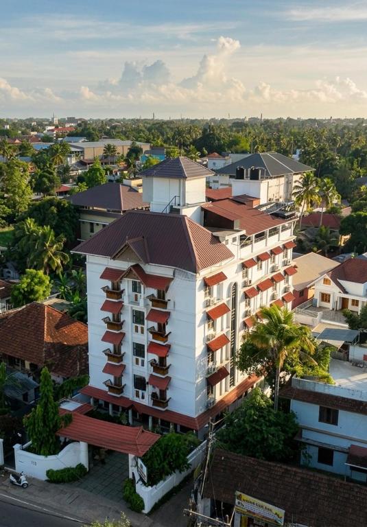 an aerial view of a building in a city at Padipura Residency in Alleppey