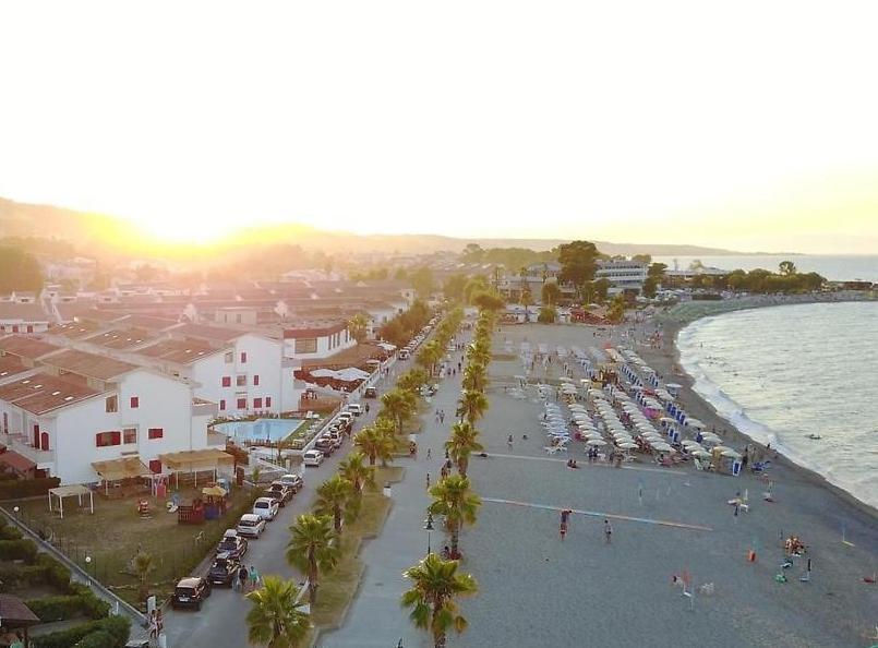 an aerial view of a beach with a group of boats at Effegi Casa Vacanze in Mandatoriccio Marina