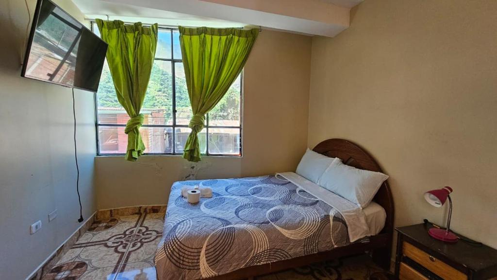 Llit o llits en una habitació de Puri