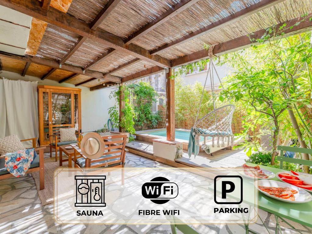 a villa with a swimming pool and a patio at L'Escale - Idéal Couple & Pro en Quête d'un Moment Détente et se Ressourcer - Sauna Exclusif & Terrasse Privée - Piscine - WIFI HD - 5min Port Toulon & Plage in Toulon
