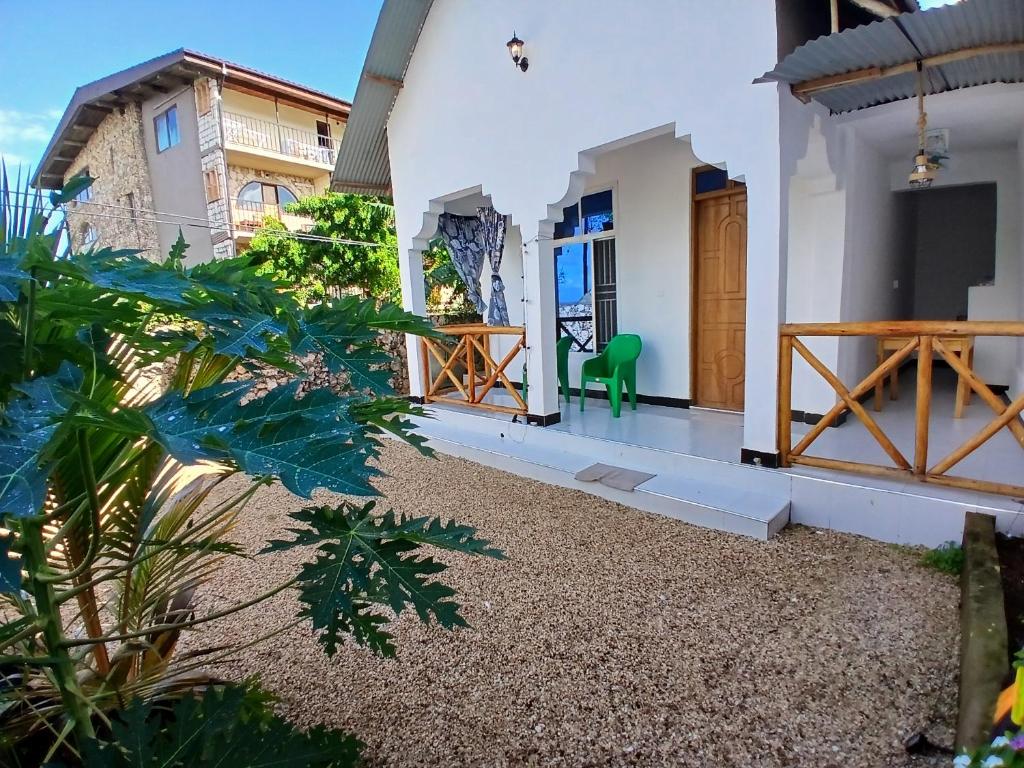 a view of the front porch of a house at Sun House Kendwa in Kendwa