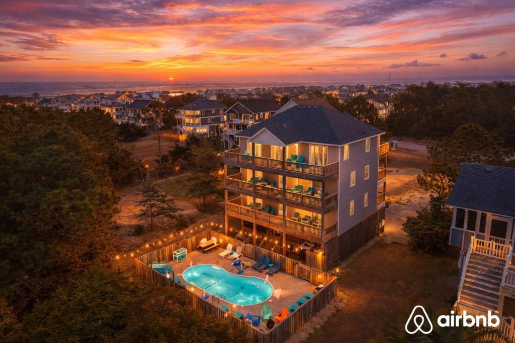 an aerial view of a house with a swimming pool at OPM Coastal Retreat in Salvo