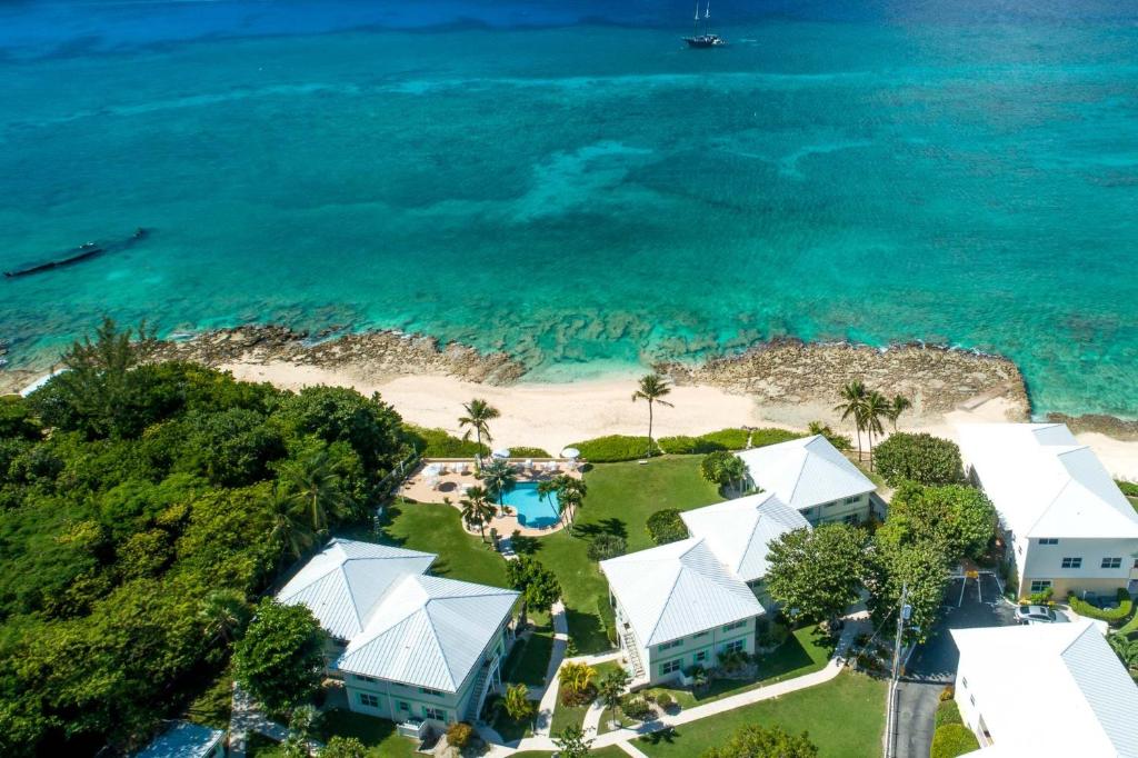 an aerial view of a house on the beach at Cocoplum #5 Condo in George Town