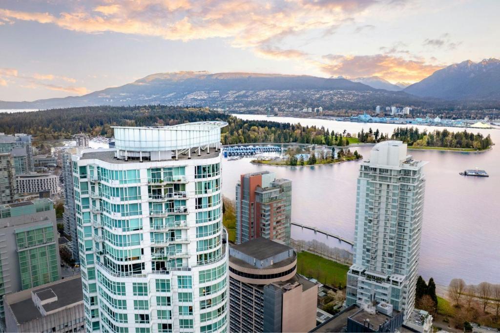 an aerial view of a city with a river and buildings at Vancouver Marriott Pinnacle Downtown Hotel in Vancouver