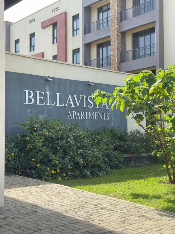 a sign for the bellavis apartment buildings at Pearl Escape in Entebbe