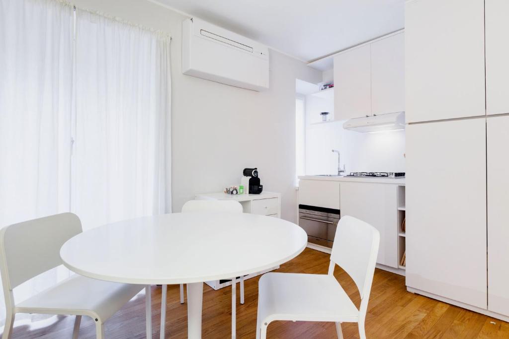 Kuchyňa alebo kuchynka v ubytovaní easyhomes - Spiga Suite