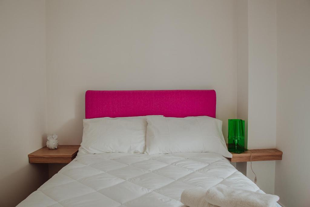 Postel nebo postele na pokoji v ubytování New Suite Lecce