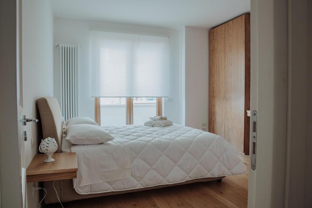 Postel nebo postele na pokoji v ubytování New Suite Lecce