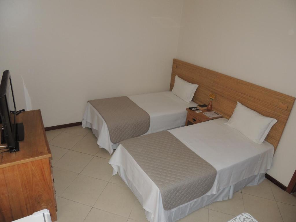 Postel nebo postele na pokoji v ubytování Hotel Pousada La Belle