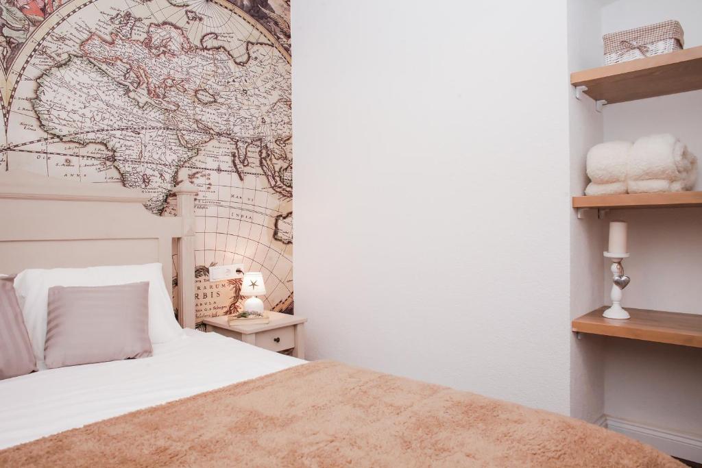 Posteľ alebo postele v izbe v ubytovaní Apartment A&E