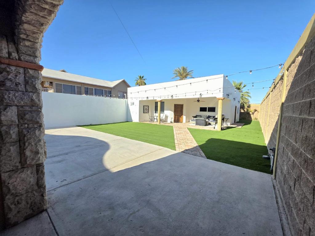 a view of a house with a yard at Casa Mona MODERN Beach Home in Puerto Peñasco