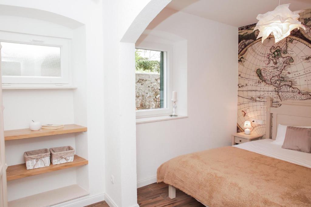 Posteľ alebo postele v izbe v ubytovaní Apartment A&E