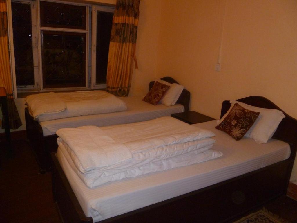 Postel nebo postele na pokoji v ubytování Andes House