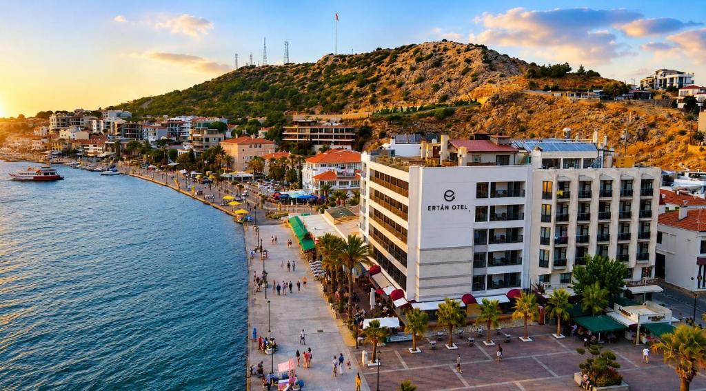 an aerial view of a city next to the water at ERTAN OTEL in Çeşme