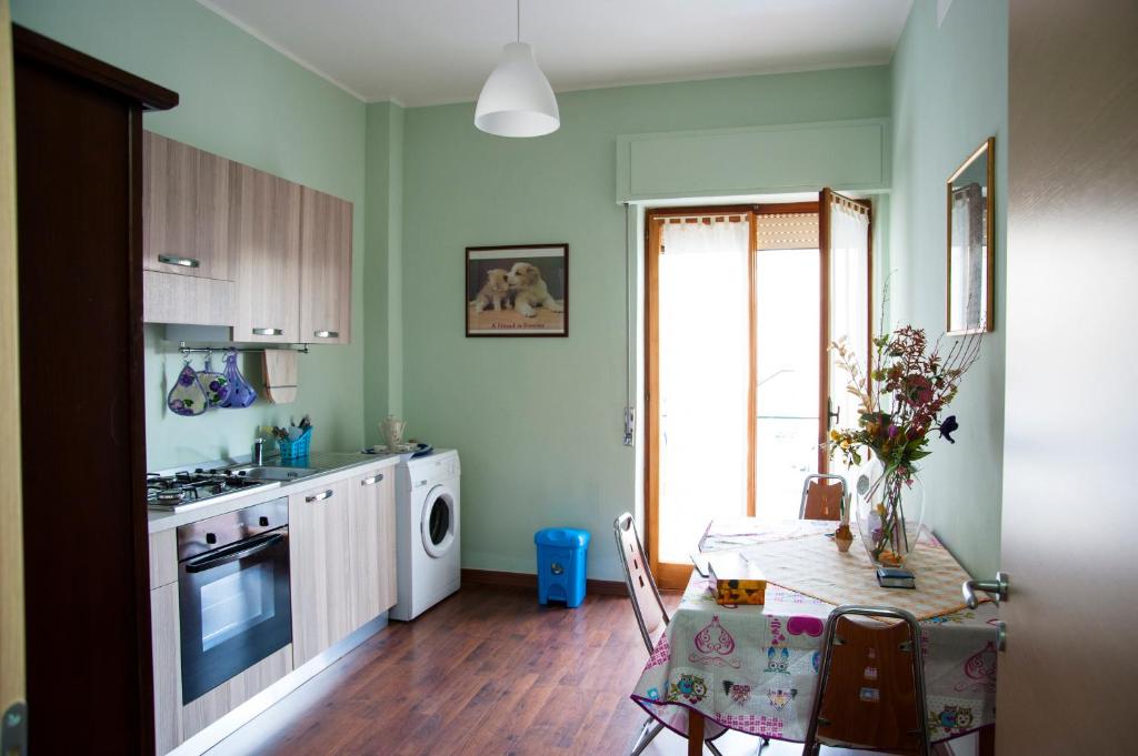 A kitchen or kitchenette at Alma b&b