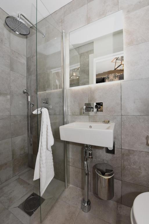 Koupelna v ubytování Hotel Mezzo