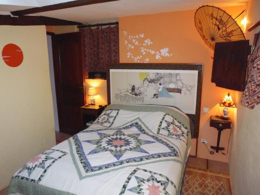 Postel nebo postele na pokoji v ubytování Gîte de La Galaisière
