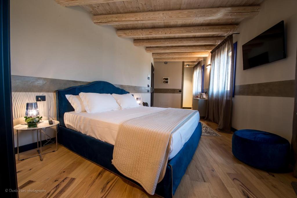 Postel nebo postele na pokoji v ubytování Podere La Torre