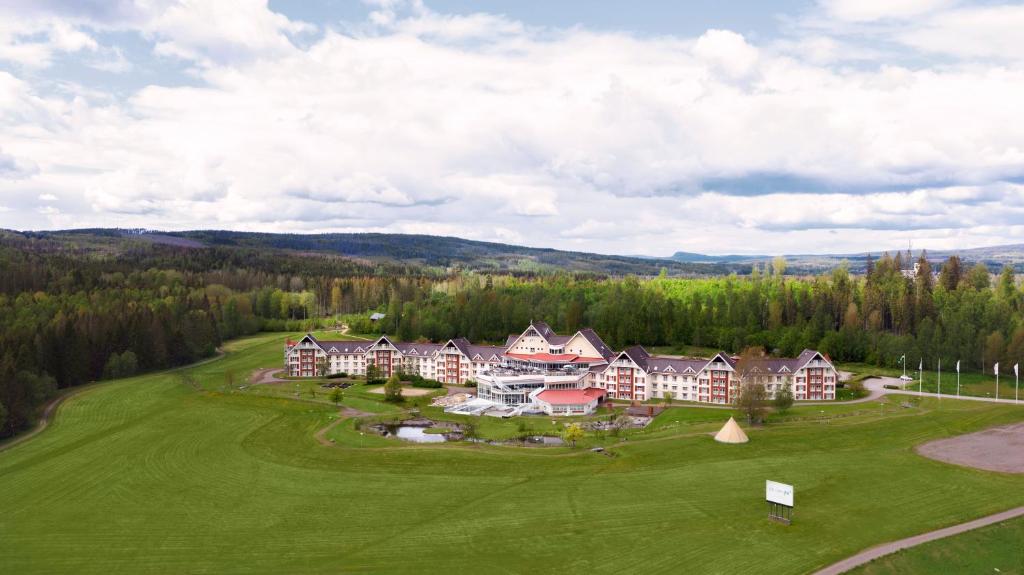 an aerial view of a large house on a golf course at Selma Spa in Sunne