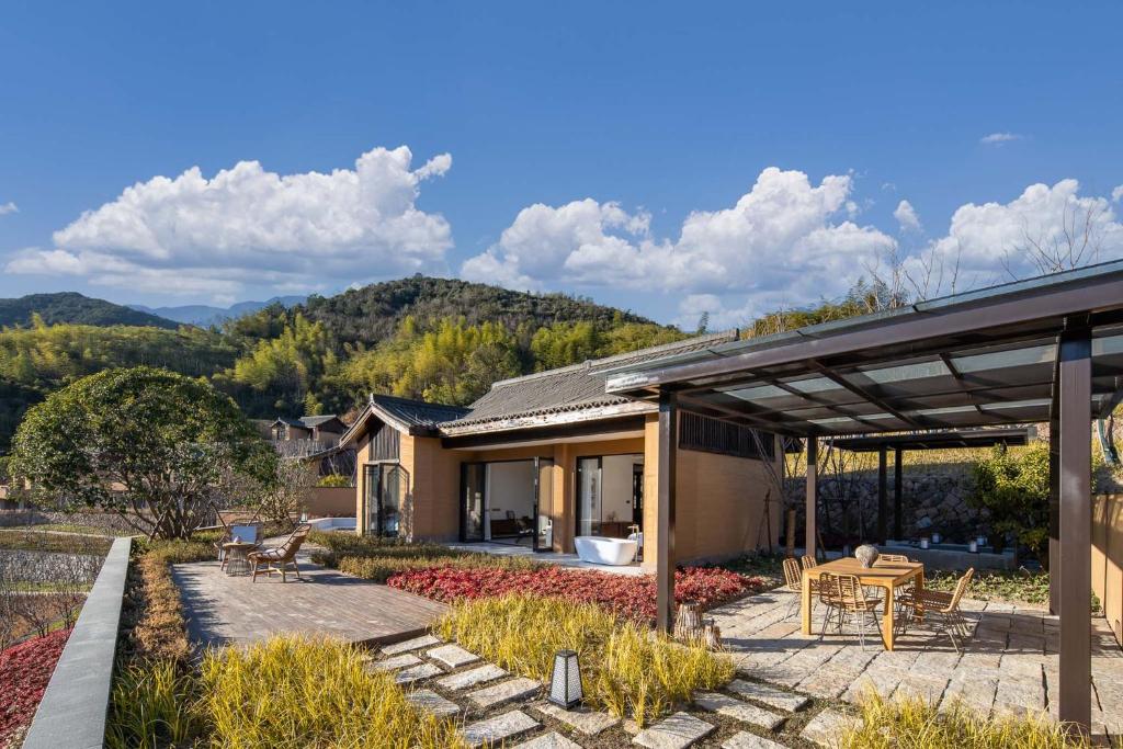 a house with a view of the backyard at ALOR VALLEY HUZHOU in Huzhou