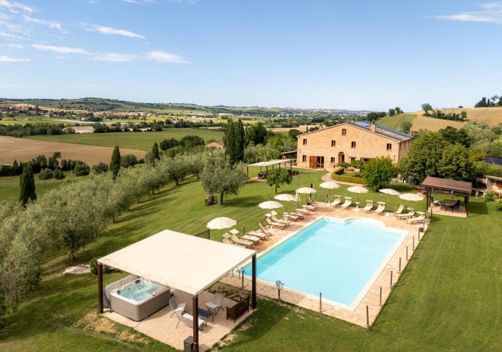 an aerial view of a villa with a swimming pool at Casalantico in Corinaldo