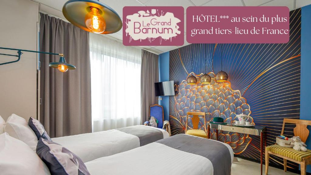 a room with four beds and a sign that reads blackpool bambinos grand at Hôtel Le Grand Barnum in Francheville