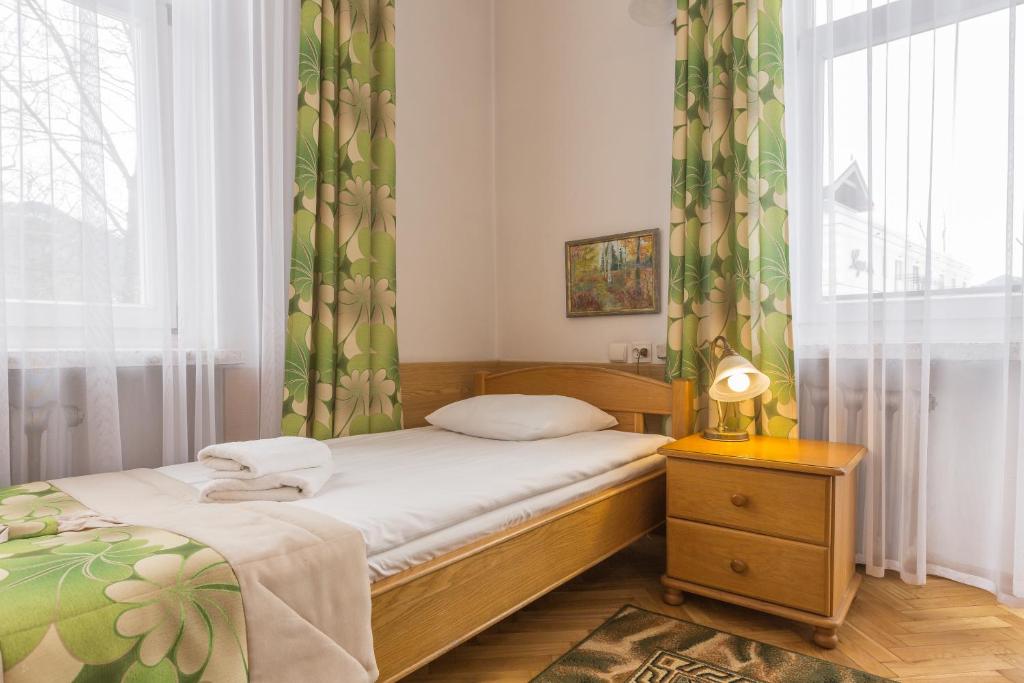 Posteľ alebo postele v izbe v ubytovaní Pensjonat Adria