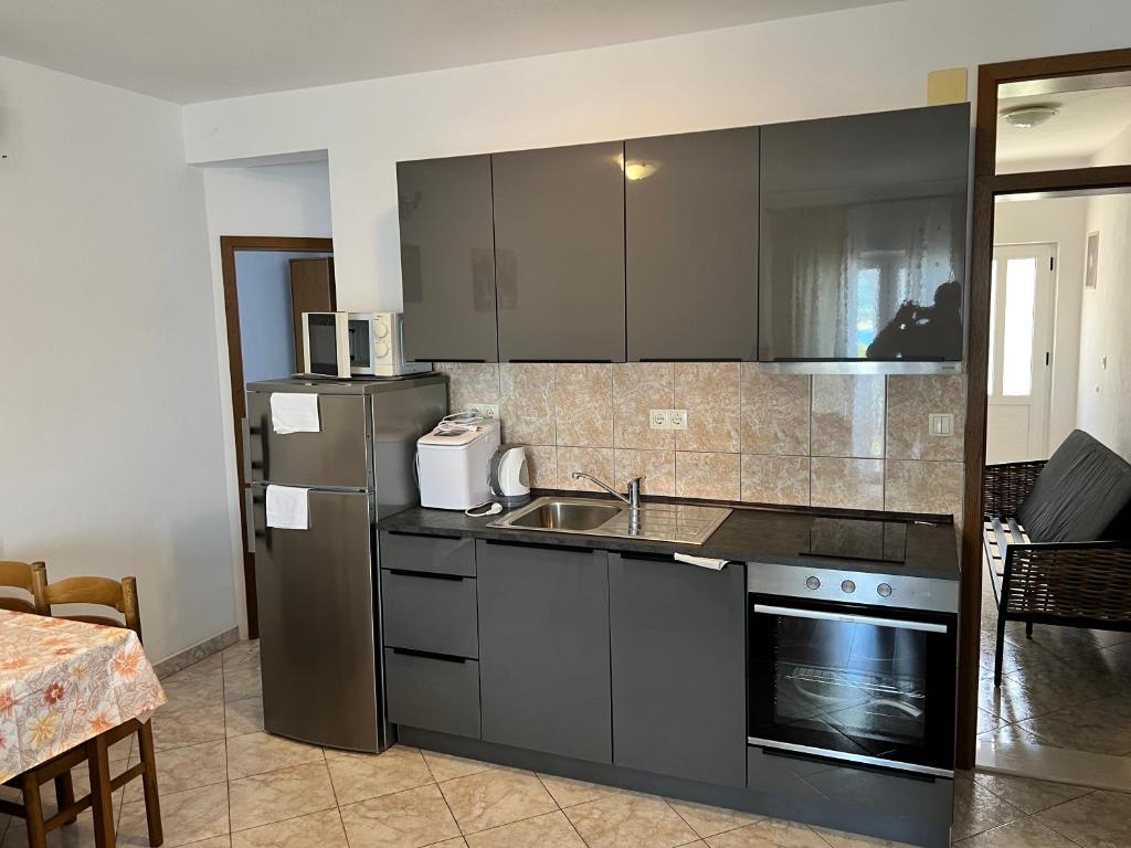 Apartmani Lacic Est