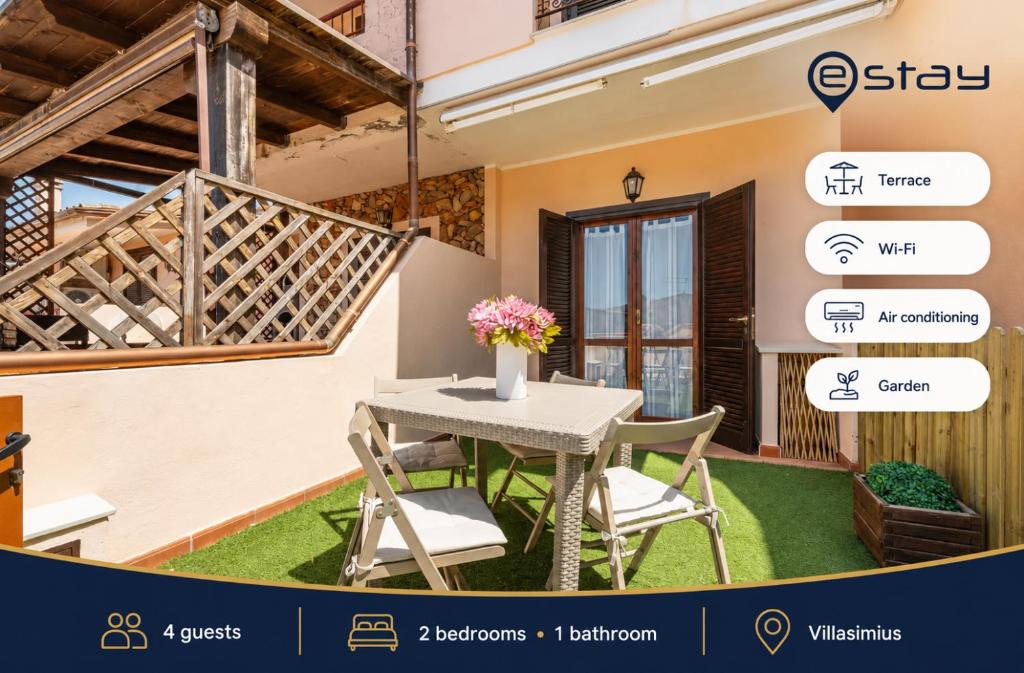 a table and chairs in front of a house at Estay - Maria's Wonderful Retreat in Villasimius