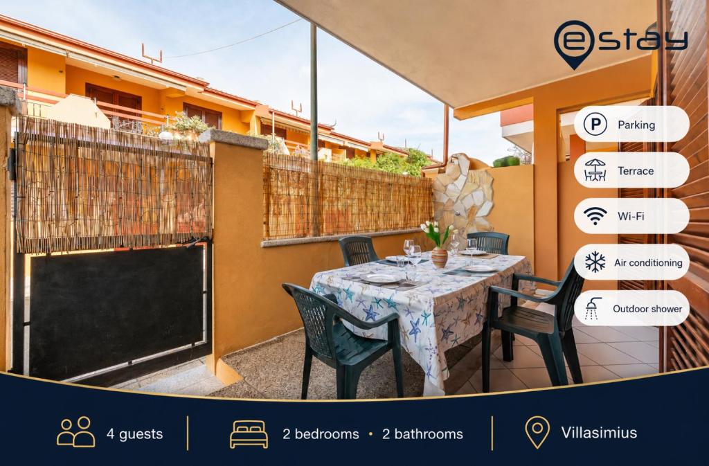 a house for sale with a private patio with a table and chairs at Estay - Villasimius Coastal Nest - AirCon & Parking in Villasimius