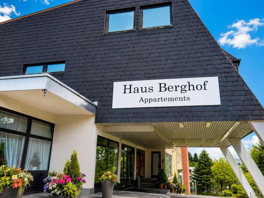 a building with a sign that reads haus bergerot apartments at Fewo Eisvogelnest in Sankt Englmar