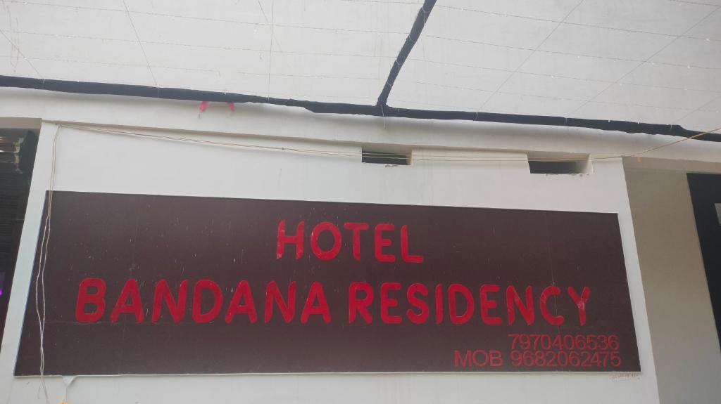 a sign for a hotel bandanares at Hotel bandana residency in Rājgīr