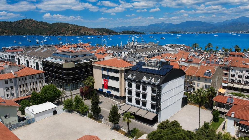 an aerial view of a city with a harbor at TELMESSOS CİTY HOTEL- Adults Only in Fethiye