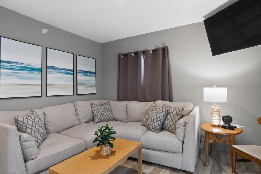 a living room with a couch and a table at Big Spirit Resort in Spirit Lake