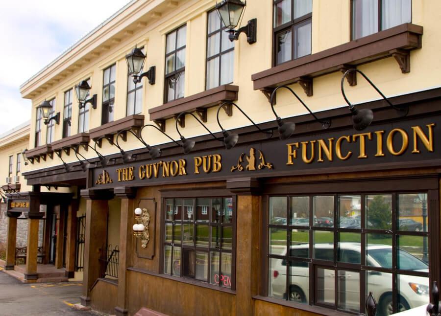 a building with a sign on the front of it at The Guv'nor Inn & Pub in St. John's