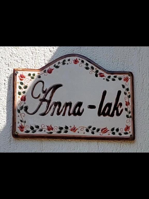 a sign for a limo lab on a wall at Anna-lak in Gyula