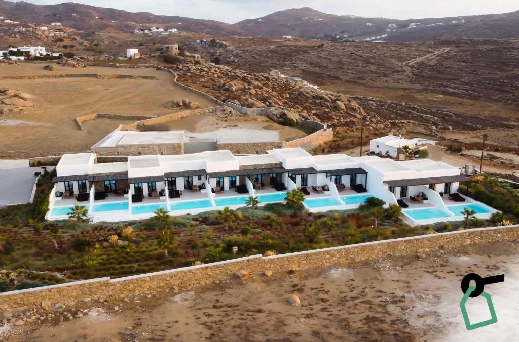 an aerial view of a villa in the desert at Hotiday Suites Mykonos in Mikonos